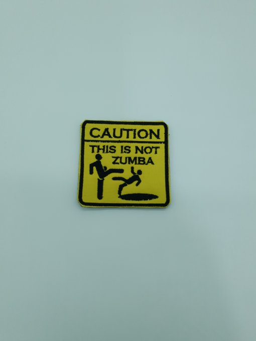 CAUTION IS NOT ZUMBA PARCHE